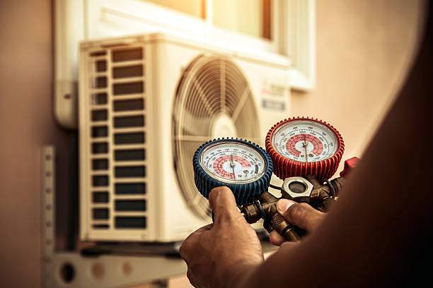 Professional Heat Pump Repair technician working in Ogden, IA